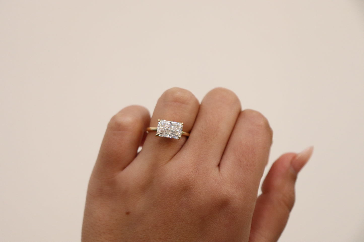 Alisha- Radiant East West Set Solitaire