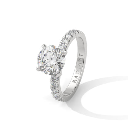 April - Classic Round Solitaire with French Pavé Band