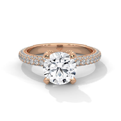 a diamond ring with three way pave band on a plain background