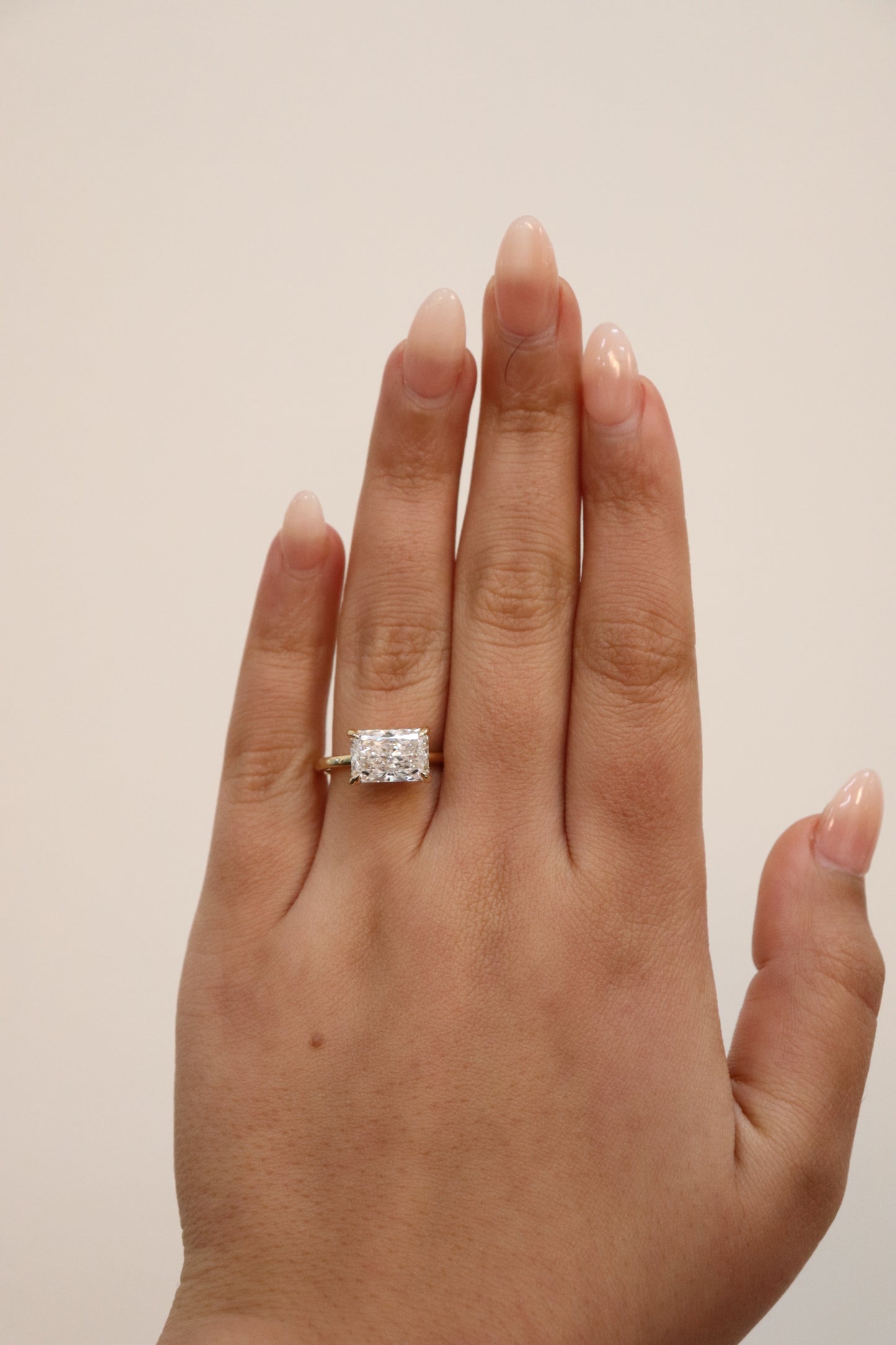 Alisha- Radiant East West Set Solitaire