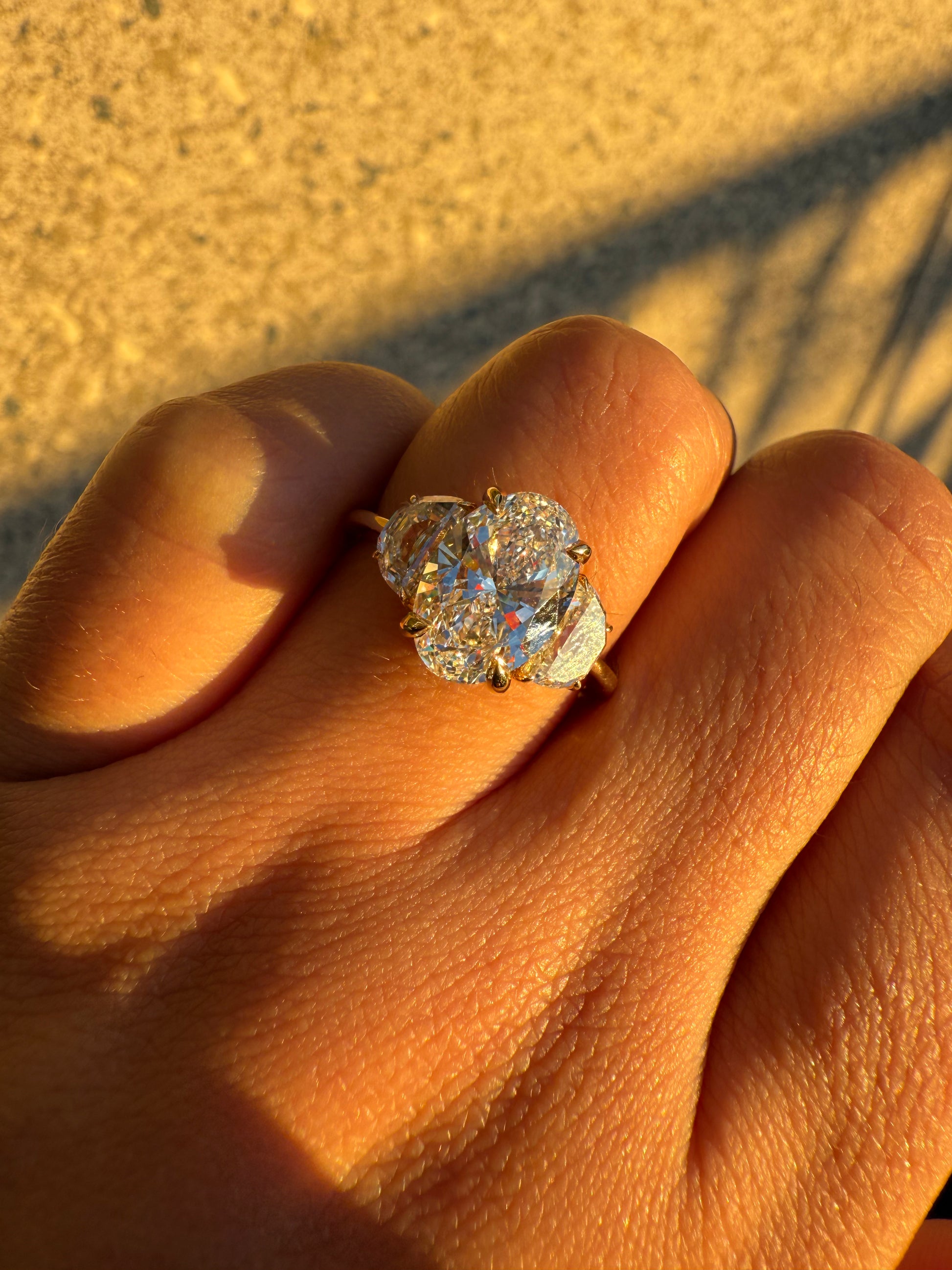 Oval Lab Grown DiamondEngagement Ring with Half moon Diamonds on the side