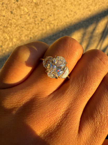 Oval Lab Grown DiamondEngagement Ring with Half moon Diamonds on the side