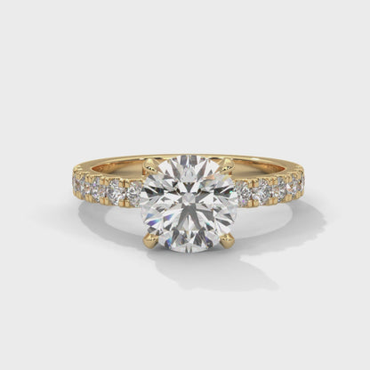 April - Classic Round Solitaire with French Pavé Band